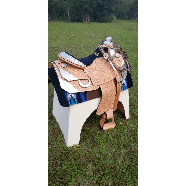 16", 17" Showman™ floral tooled silver show saddle.